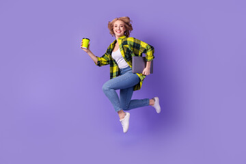 Full length photo of funky busy woman dressed checkered jacket holding device drinking morning coffee isolated purple color background