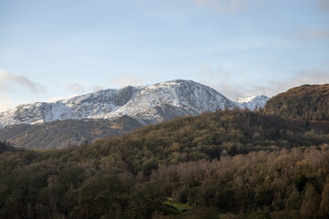 Naklejka na ściany i meble Snow covered fells around the Langdale Valley, English Lake District