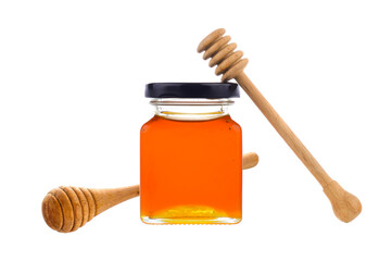Honey with wooden honey dipper on transparent png