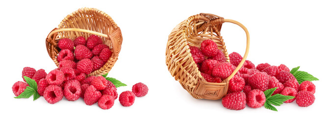 Ripe raspberries with leaf in a wicker basket isolated on white background - obrazy, fototapety, plakaty
