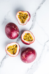 Ripe passion fruit, half and slice of fruit on a white  background.