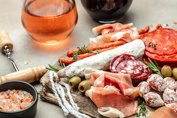 Antipasto platter cold meat plate with grissini bread sticks, Prosciutto crudo, Salami and Coppa Sausage. banner, menu, recipe place for text, top view