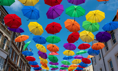 Fototapeta na wymiar Hanging Umbrellas in the Street