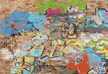 Fototapeta na wymiar Graffiti on brick wall, composite of various images, layered and altered digitally so as to be non-identifiable.