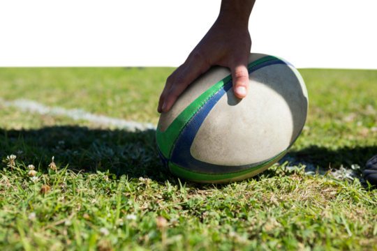 Digital png photo of caucasian male rugby player holding rugby ball on transparent background