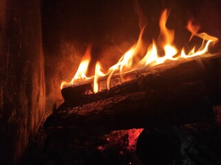 Fire in fireplace at home
