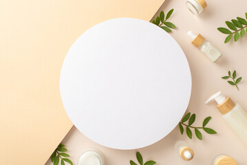 Natural cosmetic products concept. High view photo of empty sircle surrounded by cosmetic containers and eucalyptus foliage on the one side on isolated parted beige background with copy-space