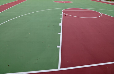Colorful Floor volleyball, futsal, basketball, badminton court with outdoor amphitheater in the...