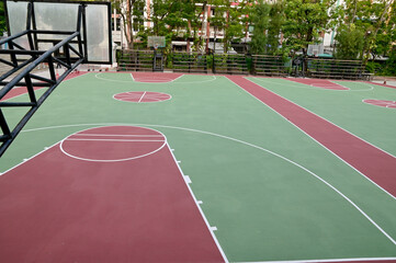 Colorful Floor volleyball, futsal, basketball, badminton court with outdoor amphitheater in the...