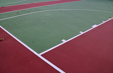 Colorful Floor volleyball, futsal, basketball, badminton court with outdoor amphitheater in the...