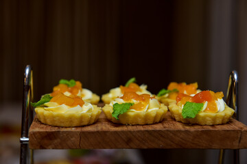 mini apricot quiche with mint, vanilla quiche with apricot and mint leaf, candy table, party...