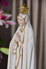 person in the church, our lady of fatima, Feast of Our Lady of Fatima

