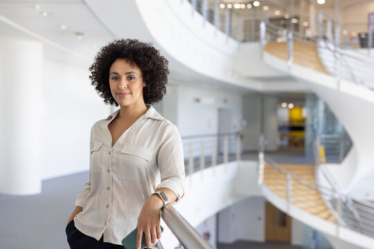 Portrait of an African American businesswoman in modern corporate office atrium