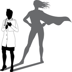 A superhero medical doctor woman health care worker revealed by her shadow silhouette as a super hero in a cape.