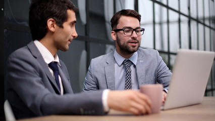 Fototapeta premium Business Having Meeting Around Table In Modern Office