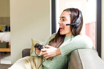 pretty young woman gamer concept. house interior design © kues1