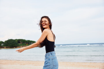 Fototapeta na wymiar woman young running happiness lifestyle sunset sea summer travel beach smile