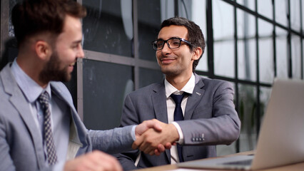 managers discussing plans in a modern office