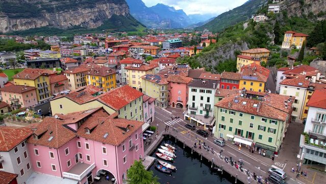 Scenic Garda lake , popular beautiful town and resort Torbole. aerial drone overflight 4k video. Trentino, Lago di Garda, Italy