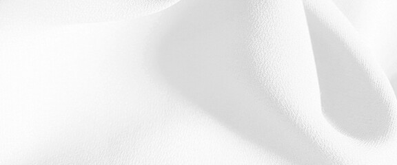 White fabric cloth background texture, white chiffon fabric draped with large folds, wave textile background, white satin silk, elegant fabric for backgrounds.