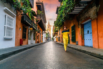 Fototapeta na wymiar Afro latin tropical man walking in cartagena colombia colonial street