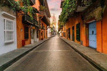 Street of Cartagena de Indias old colonial city in colombia colorful houses with church and balcony 
