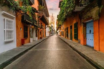Foto op Canvas Street of Cartagena de Indias old colonial city in colombia colorful houses with church and balcony  © Blogtrip