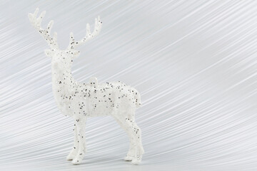 On a silver background, a white Christmas deer.