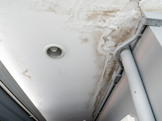Ceiling panels with fungus outside house from water pipes damaged or rainy leaked. Office building or house problem for house service. - 615122680