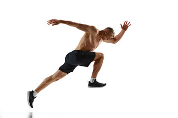 Fototapeta na wymiar Endurance. Dynamic image of professional sportsman, shirtless muscular man in motion, running, training against white studio background