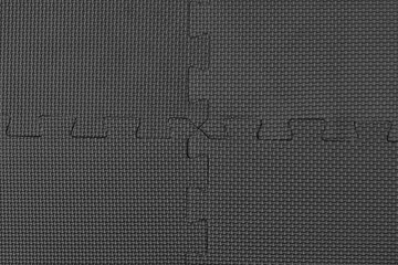 Foam puzzle mat texture background.