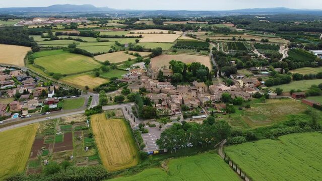 4K Drone Footage. Pubol. Old Village Of Girona. Colorful fields. Catalonia. Spain. 12 june 2023