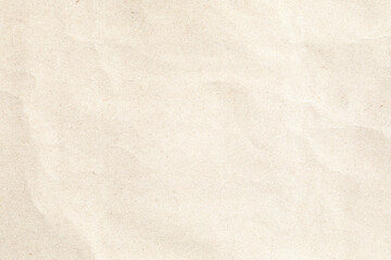 Fototapeta na wymiar Soft brown crumpled parchment paper texture