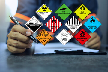 Security officers working with clipboards and inspect the storage of dangerous goods hazard substance on the desktop for operator safety such as explosions, radioactive, toxic gases, etc. - obrazy, fototapety, plakaty