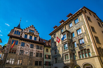 Lovely close-up view of the traditional houses on Hirschenplatz in the Old Town of Lucerne, with...