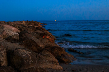 Evening atmosphere on the sandy beach of Carnon in France