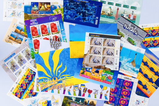 Ukrposhta. A set of different Ukrainian postage stamps and postcards. War stamp. Kyiv, Ukraine - June 20, 2023.