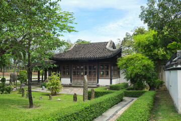 Fototapeta na wymiar Ancient style Chinese building in Rama 9 park in Bangkok , Thailand . China and east asia architecture and garden