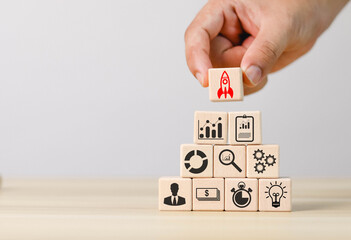 A wooden block showing a rocket icon. This is the beginning of a new generation of Entrepreneurs, Business Ideas, Startups, Entrepreneurs and Online Digital Business Networks on online marketing, tech