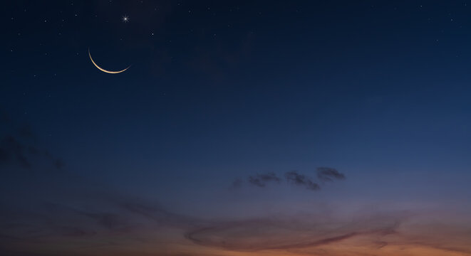 Crescent moon on dark blue sky background well free space for religion Islamic with text Arabic, Eid al Adha, Eid Al Fitr 