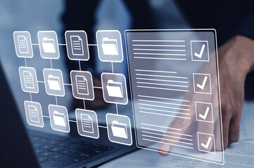 Documents management information system concept, Businessman using visual screen internet for Documents management information system and ERP program data directory in company, ERP document © Suriyo