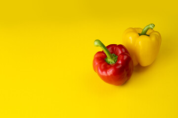 Sweet peppers on a yellow background