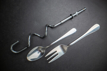 Top view of necessary kitchen items on isolated black background