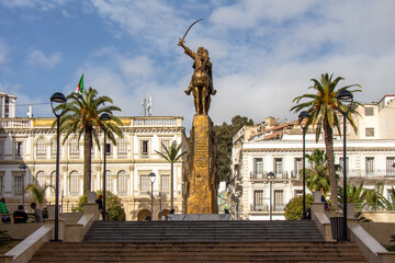 Algiers (Alger), Algeria, April 19 2023 : Emir Abdelkader Statue in the Emir Abdel Kader square, situated near Alger Centre and the City Hall. Text in English : tribute to this historic character.
