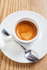 cup of coffee on the wooden table