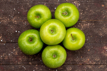 a top view green apple fresh sour and mellow on the dark background fruit color vitamine