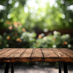 Fototapeta premium Empty table for product display montages with green garden home background. High quality photo