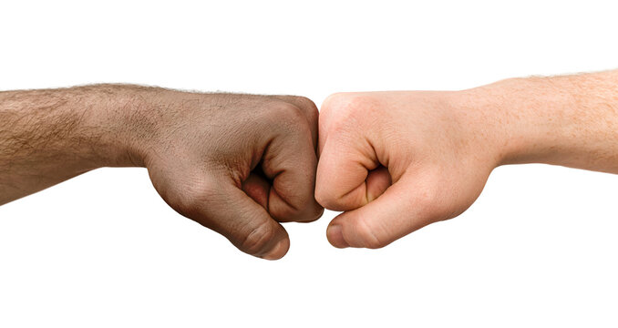 hand of a white man and an African American are touching fists. on a white isolated background