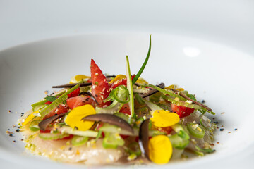 Close up of a plate of Gourmet and gastronomic mix of various Vegetables ingredients, entree dish