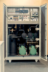 Soundproof cabinet for compressor refrigeration unit.